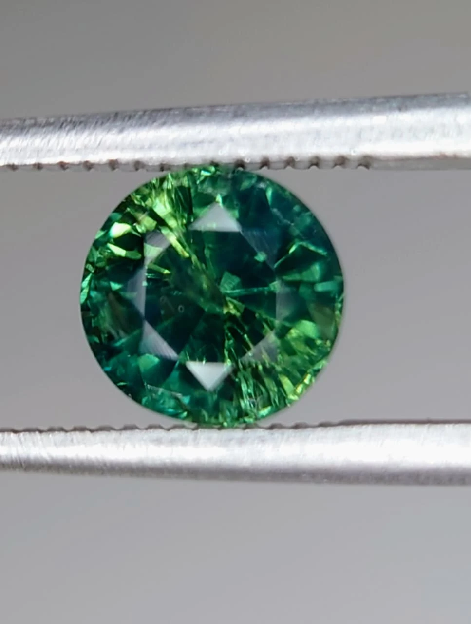 1.3ct Bluish Green Natural Round Faceted Sapphire from Nigeria — view 2